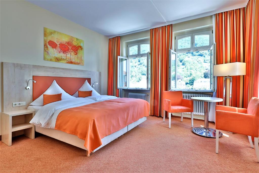 Postel nebo postele na pokoji v ubytování City Partner Hotel Holländer Hof