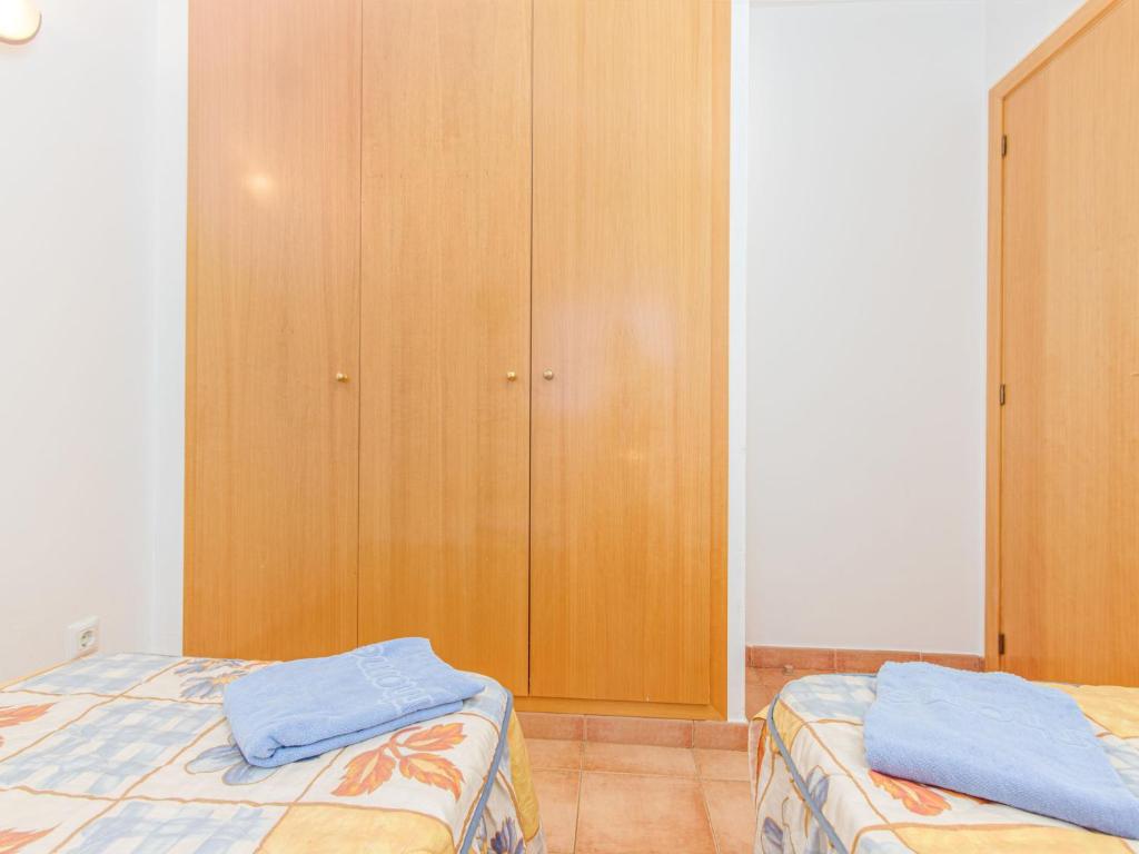 Postel nebo postele na pokoji v ubytování Apartment Stella Maris-1 by Interhome