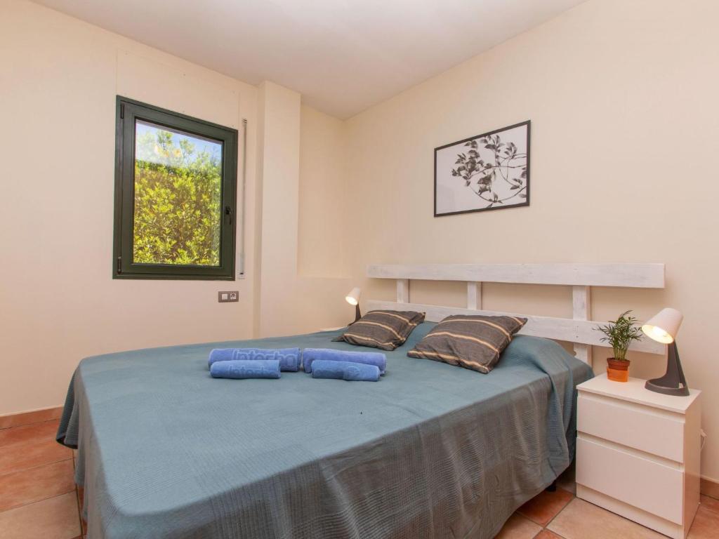 Posteľ alebo postele v izbe v ubytovaní Holiday Home Ullastreta by Interhome