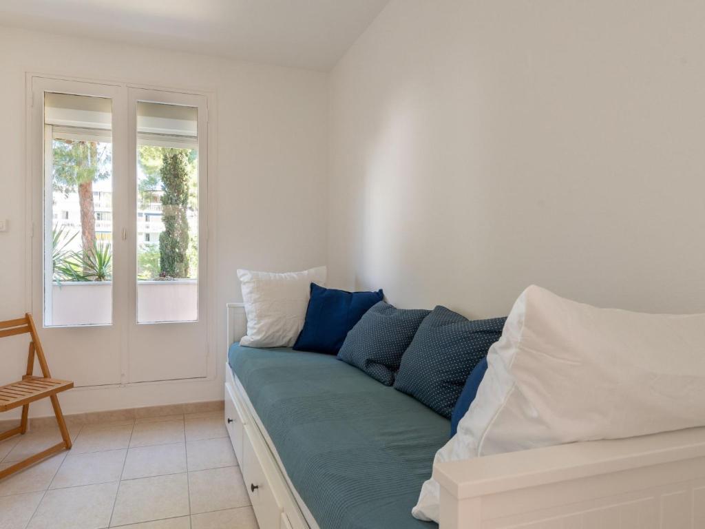 Posteľ alebo postele v izbe v ubytovaní Apartment Antinéa-4 by Interhome