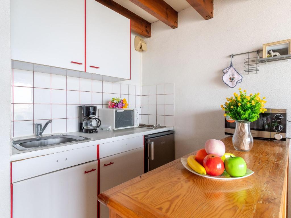 Kuchyň nebo kuchyňský kout v ubytování Apartment Belvédère 4 by Interhome