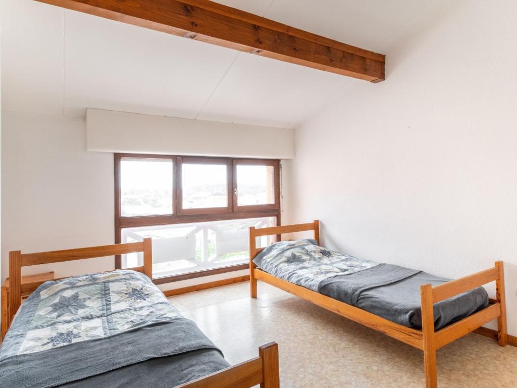 Postel nebo postele na pokoji v ubytování Apartment Belvédère 4 by Interhome