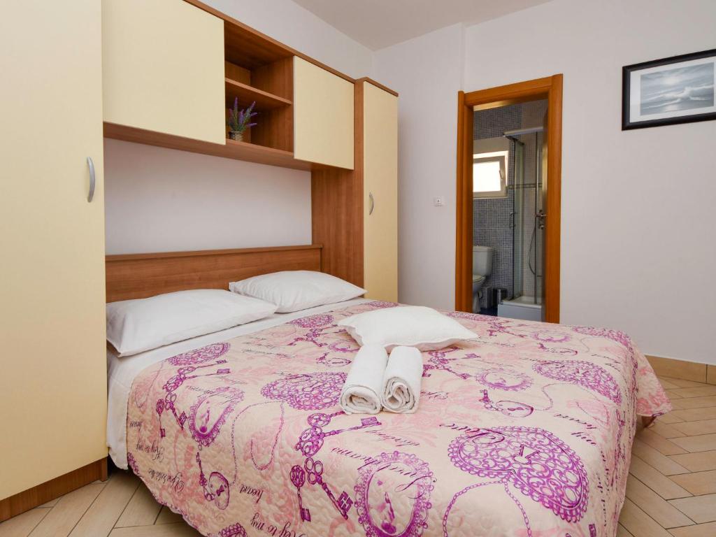 Posteľ alebo postele v izbe v ubytovaní Apartment Tanja-1 by Interhome