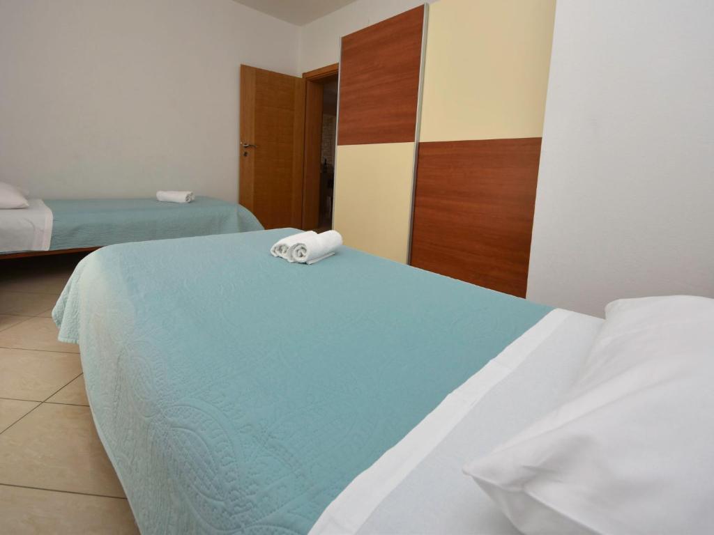Posteľ alebo postele v izbe v ubytovaní Apartment Tanja-1 by Interhome
