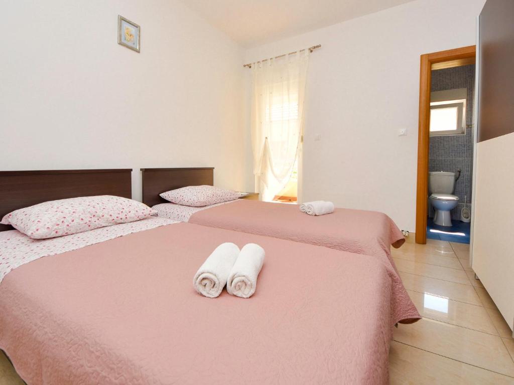 Posteľ alebo postele v izbe v ubytovaní Apartment Tanja-1 by Interhome