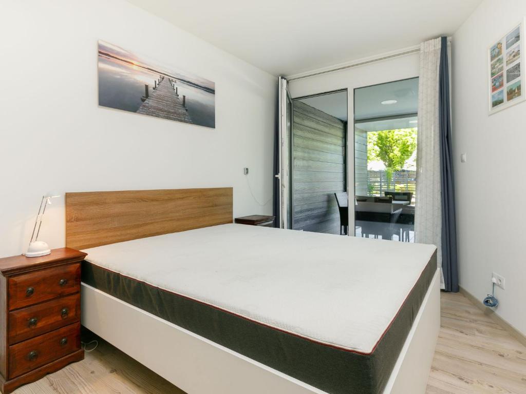 Posteľ alebo postele v izbe v ubytovaní Apartment Marianna by Interhome