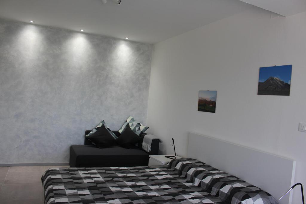 Postel nebo postele na pokoji v ubytování B&B Fili d'erba