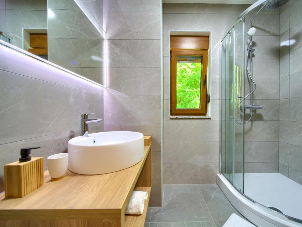 Koupelna v ubytování Holiday Home Magna Tilia by Interhome