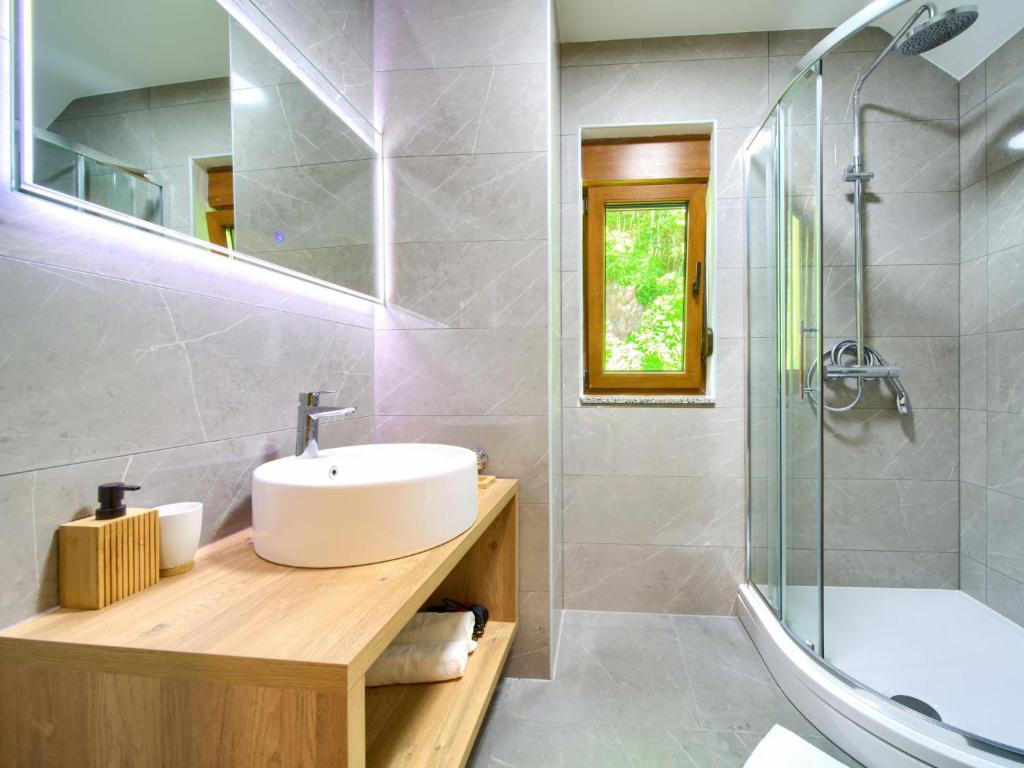 Koupelna v ubytování Holiday Home Magna Tilia by Interhome