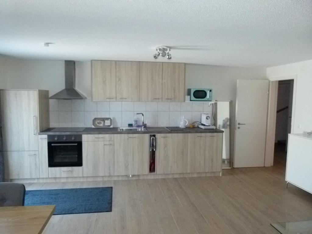 Köök või kööginurk majutusasutuses Maison d'hôtes Bleu Cudrefin