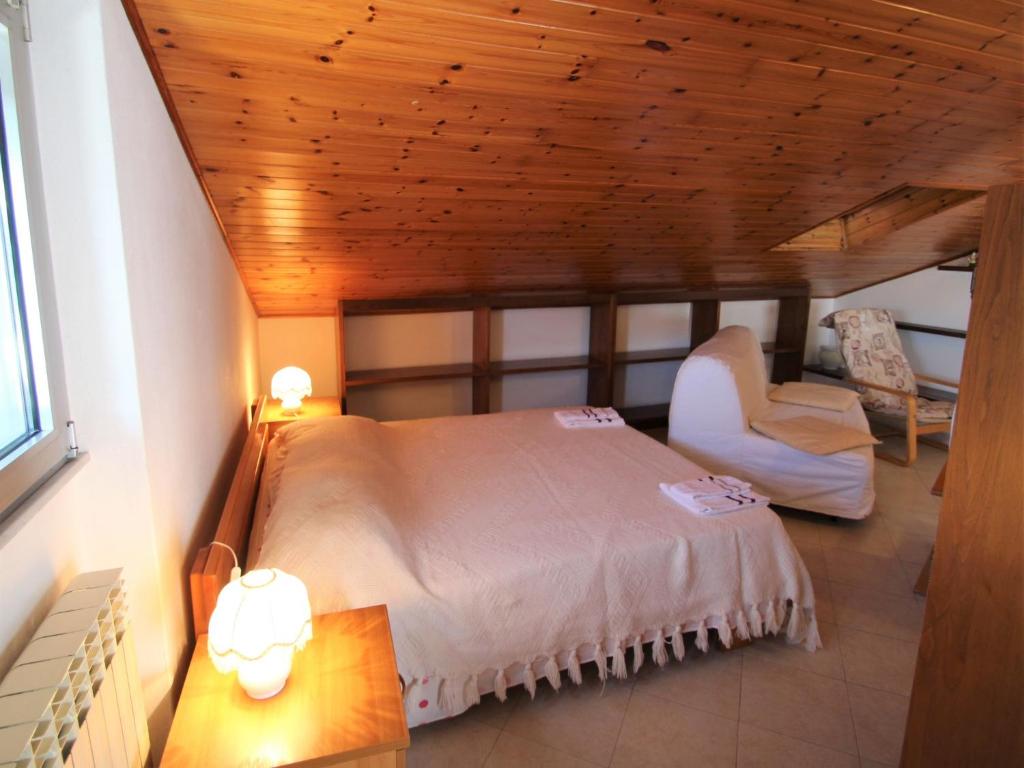 Posteľ alebo postele v izbe v ubytovaní Apartment Brunetta by Interhome