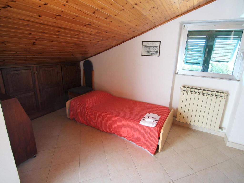 Posteľ alebo postele v izbe v ubytovaní Apartment Brunetta by Interhome