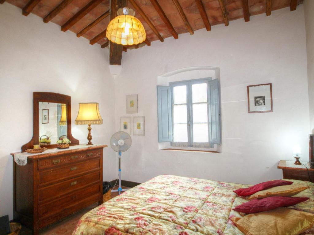 Łóżko lub łóżka w pokoju w obiekcie Holiday Home Le Bonatte by Interhome