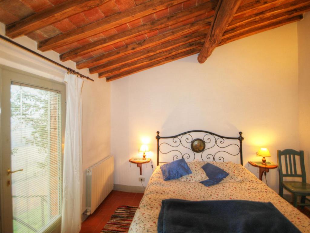 Łóżko lub łóżka w pokoju w obiekcie Holiday Home Le Bonatte by Interhome