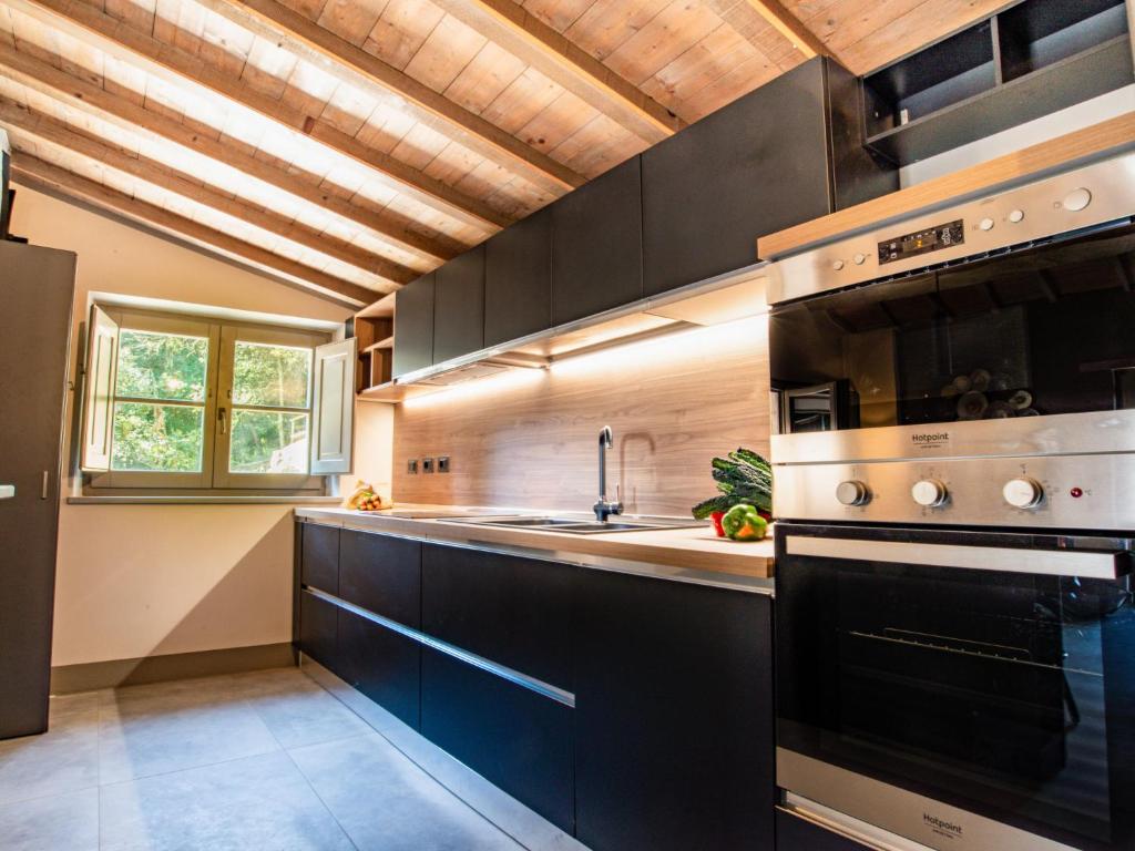 A kitchen or kitchenette at Chalet Il Talamo by Interhome