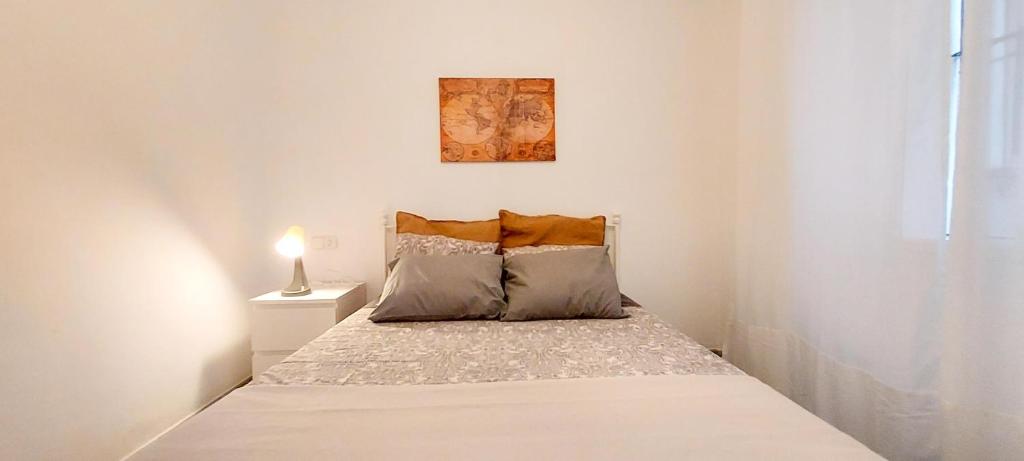 Posteľ alebo postele v izbe v ubytovaní Apartamento MURILLO-PLAZA DE LA MAGDALENA