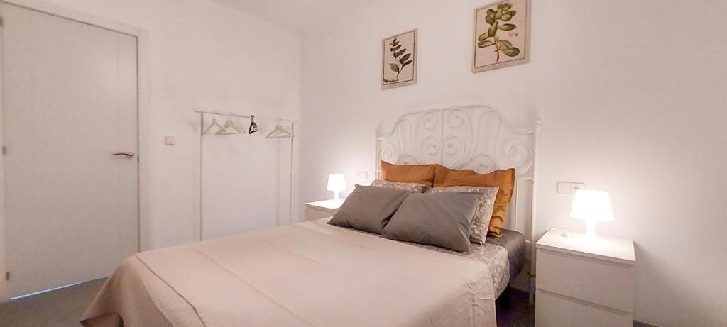Posteľ alebo postele v izbe v ubytovaní Apartamento MURILLO-PLAZA DE LA MAGDALENA