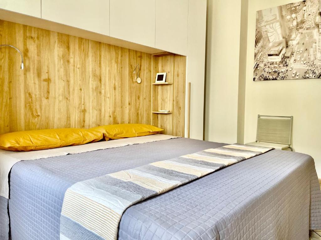 Łóżko lub łóżka w pokoju w obiekcie Viale Umberto I Apartments