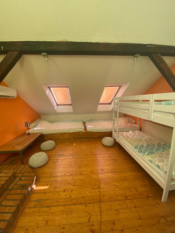 Postel nebo postele na pokoji v ubytování Unity Hostel Budapest
