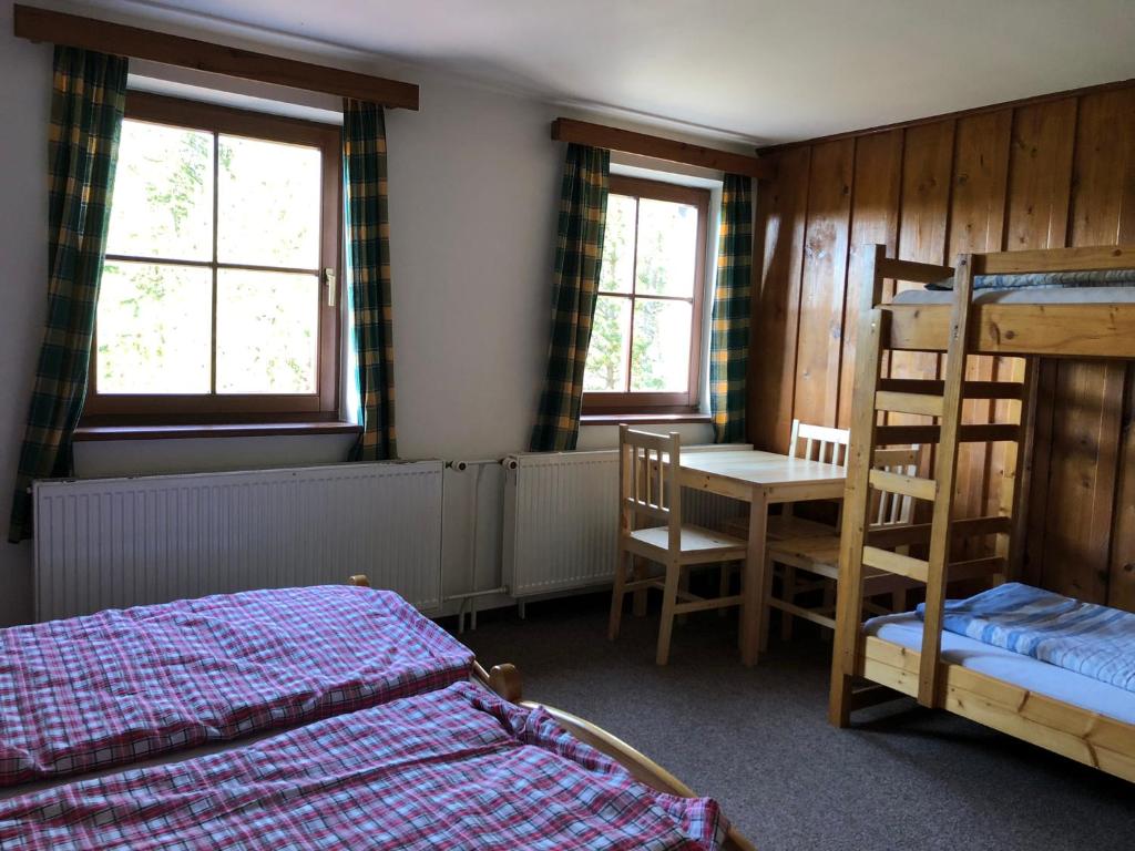 Postel nebo postele na pokoji v ubytování Penzion ''Pod Hůreckým vrchem''