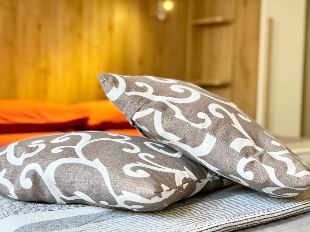 Łóżko lub łóżka w pokoju w obiekcie Viale Umberto I Apartments