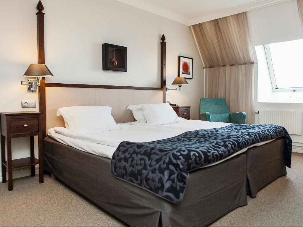 Postel nebo postele na pokoji v ubytování Elite Grand Hotel Norrköping