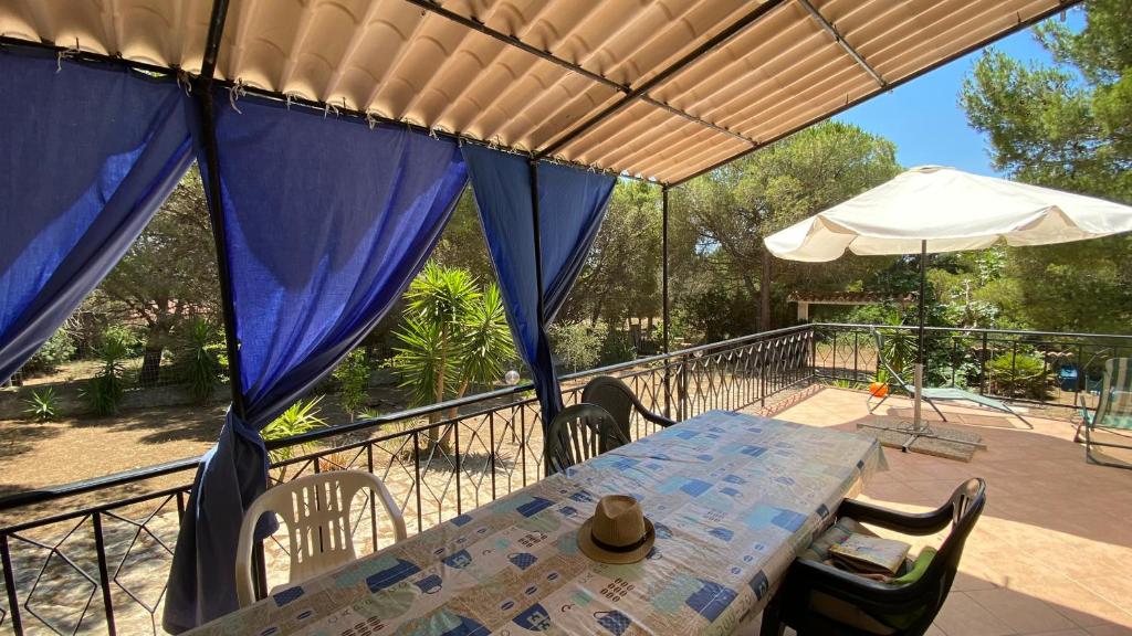 Mario & Nina a Porto Pino - Accogliente Casa con Giardino