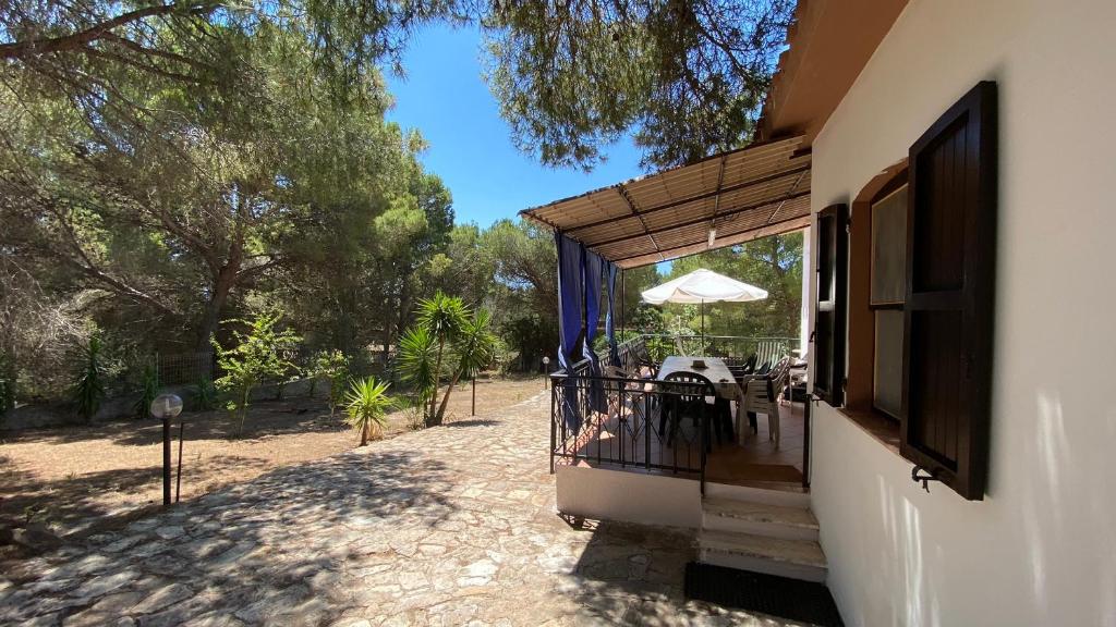 Mario & Nina a Porto Pino - Accogliente Casa con Giardino