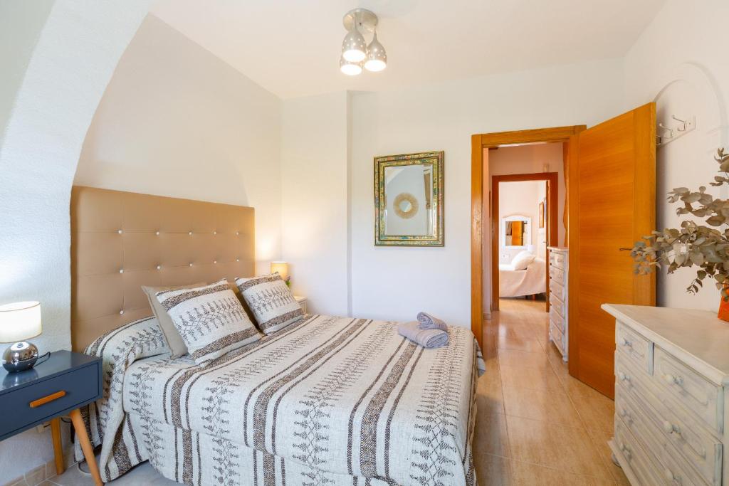 Postel nebo postele na pokoji v ubytování Fidalsa Coastal Soul
