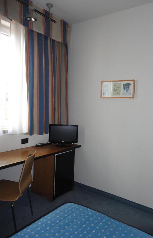 TV a/nebo společenská místnost v ubytování Cravero Rooms