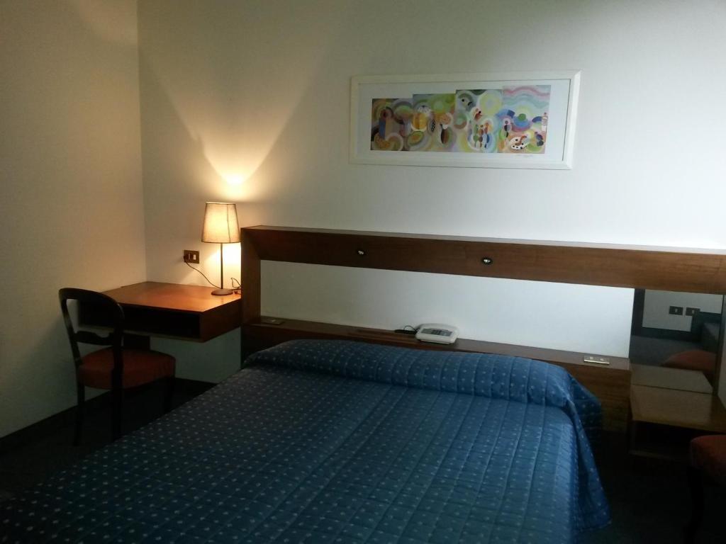 Postel nebo postele na pokoji v ubytování Cravero Rooms