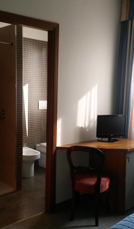 TV a/nebo společenská místnost v ubytování Cravero Rooms
