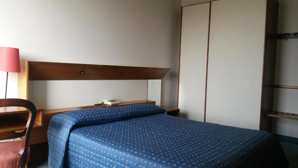 Postel nebo postele na pokoji v ubytování Cravero Rooms