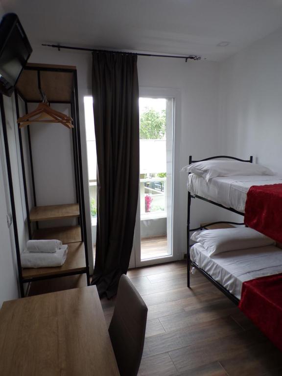 Posteľ alebo postele v izbe v ubytovaní Hotel Nord Est