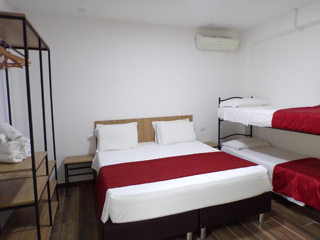Posteľ alebo postele v izbe v ubytovaní Hotel Nord Est