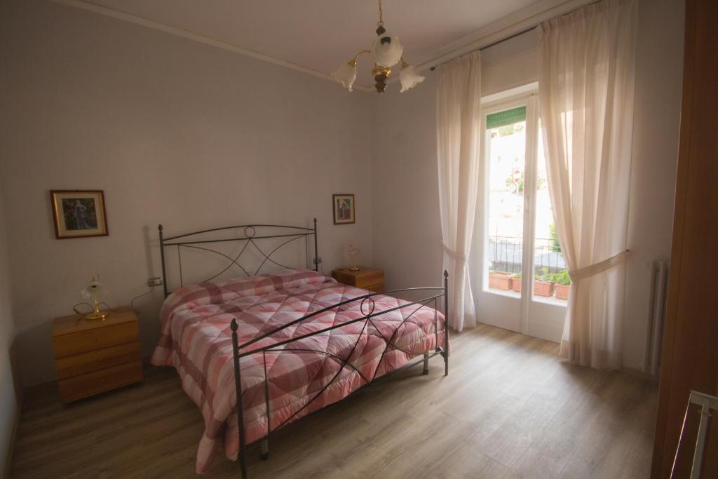 Łóżko lub łóżka w pokoju w obiekcie Appartamento Da Lucilla