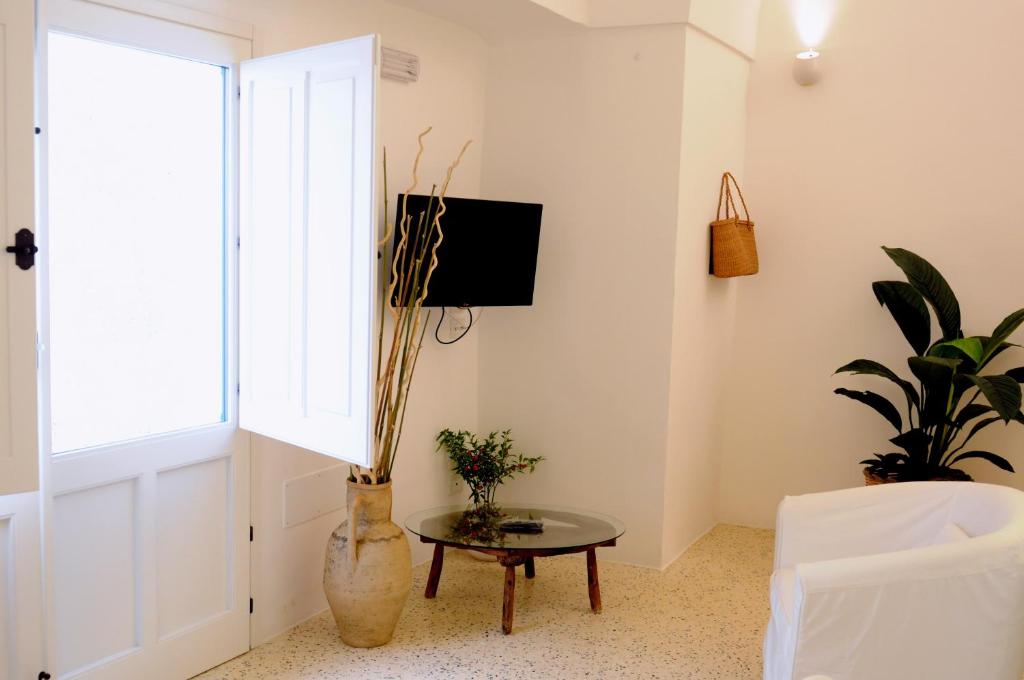 TV a/nebo společenská místnost v ubytování Holiday home La Corte dei Pirri