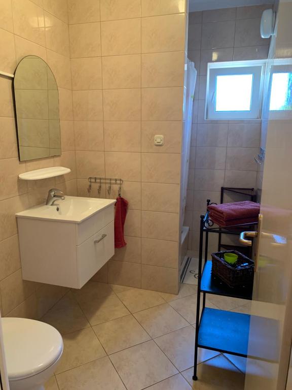 Koupelna v ubytování Apartments Mais Tisno