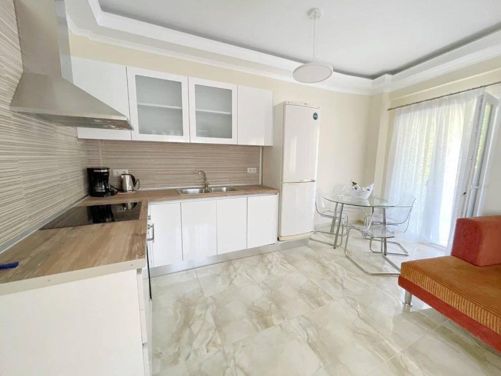 Kuchyň nebo kuchyňský kout v ubytování Magic Fourka Apartment