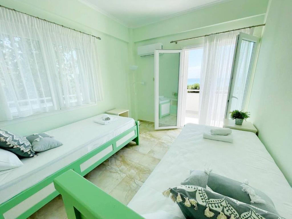 Postel nebo postele na pokoji v ubytování Magic Fourka Apartment