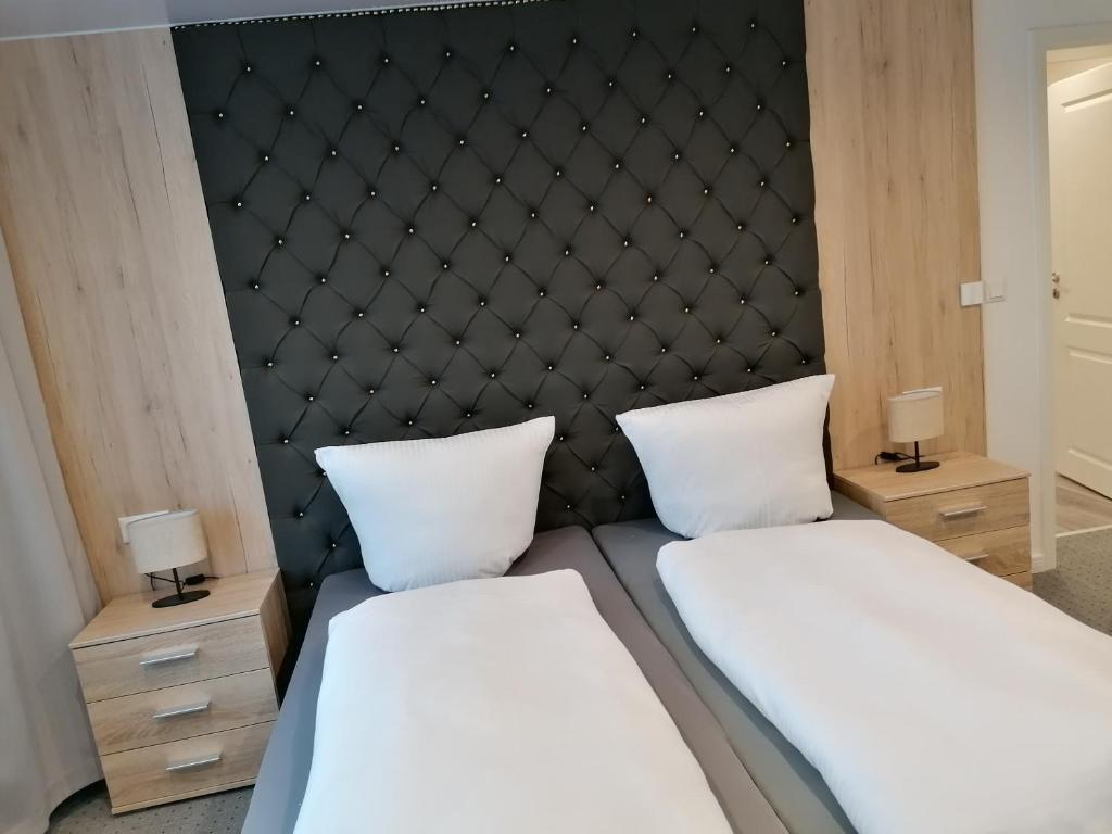 Postel nebo postele na pokoji v ubytování Klein Haus 12A