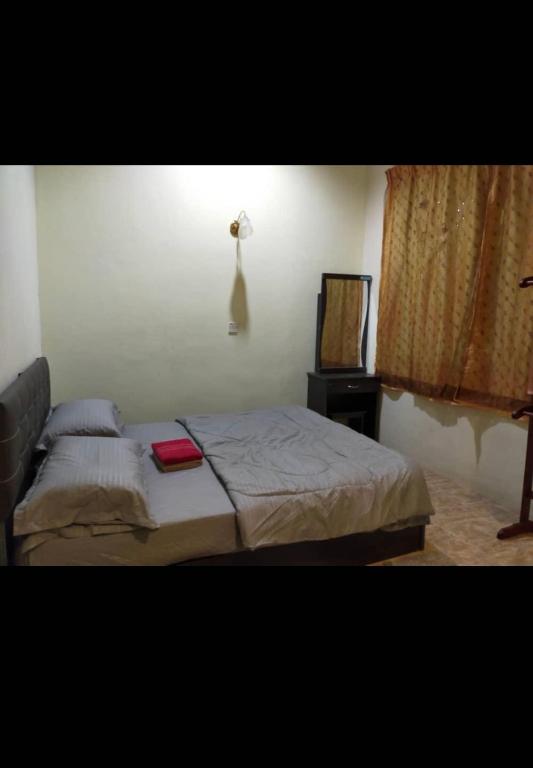 Postel nebo postele na pokoji v ubytování SMZ Café & Homestay - SELF CHECK IN