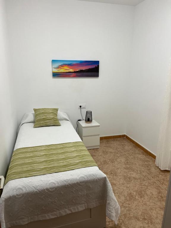 Postel nebo postele na pokoji v ubytování Casa Escanfraga II