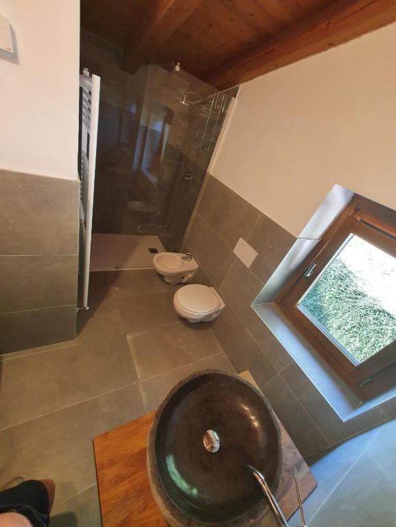 Koupelna v ubytování Eco Chalet Nonno Silvano