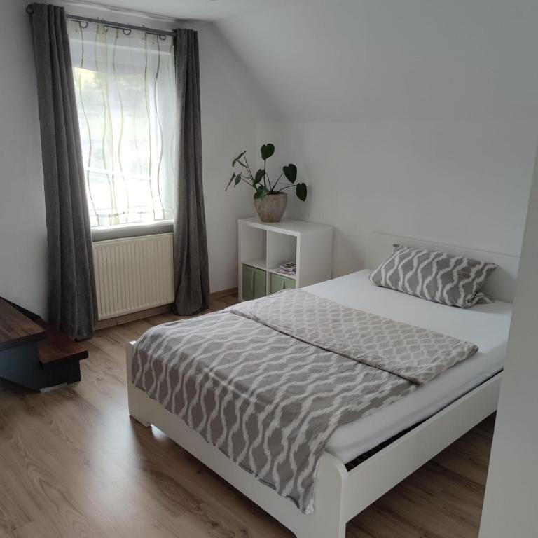 Postel nebo postele na pokoji v ubytování Am Belz