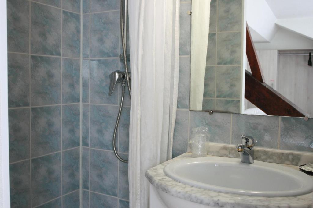 Koupelna v ubytování Hotel Christian