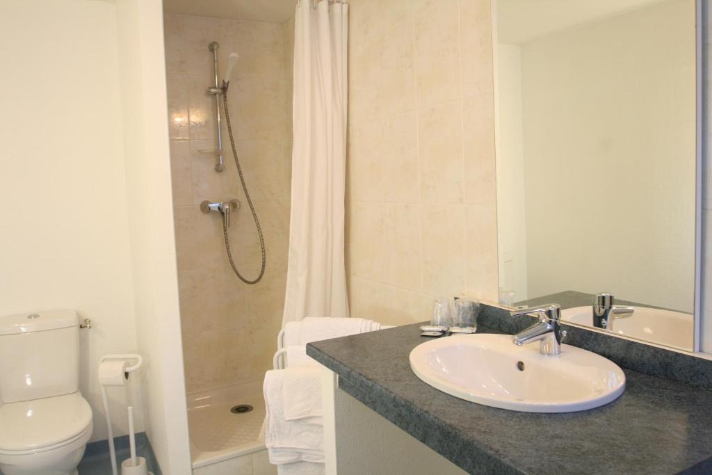 Koupelna v ubytování Hotel Christian