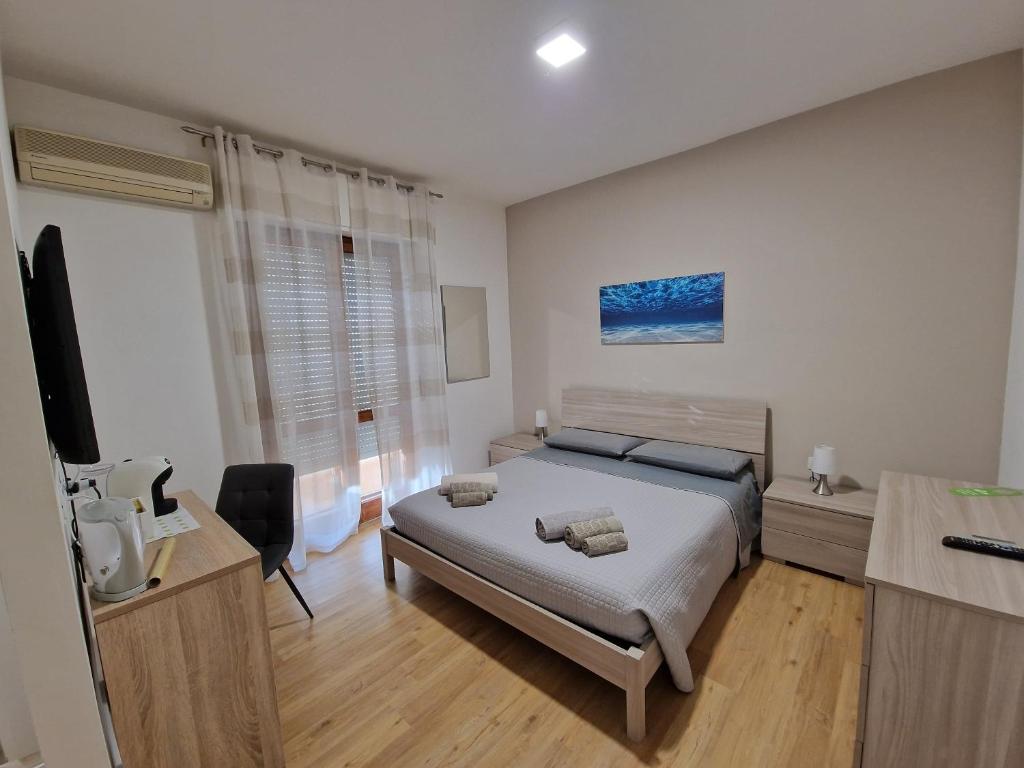 Letto o letti in una camera di The Shell Guest House