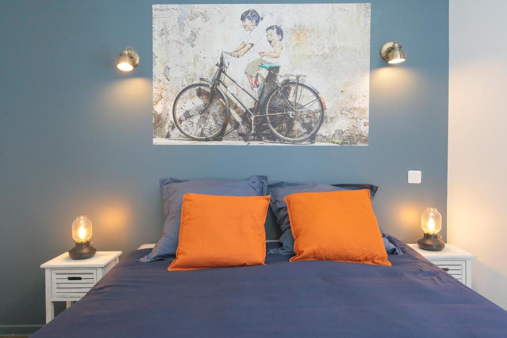 Postel nebo postele na pokoji v ubytování Le Rétro, T2 hypercentre chic et cosy, Wifi par SOVALFI