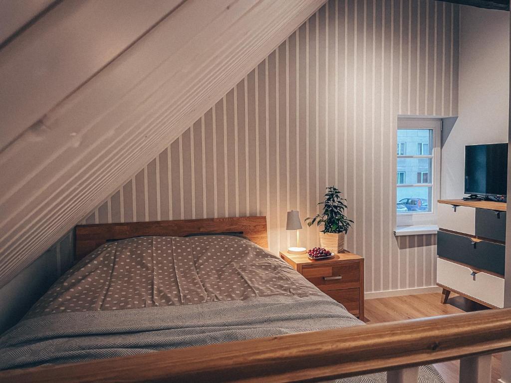 Postel nebo postele na pokoji v ubytování Tamula loftid